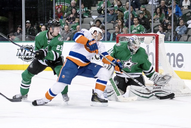 John Tavares of the New York Islanders and Antti Niemi of the Dallas Stars