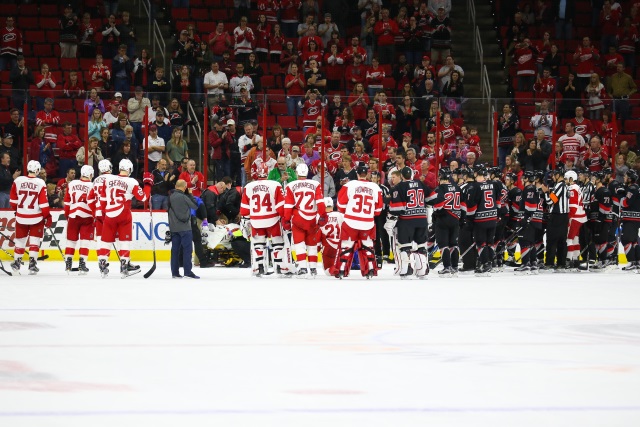 Carolina Hurricanes Eddie Lack taken off on a stretcher