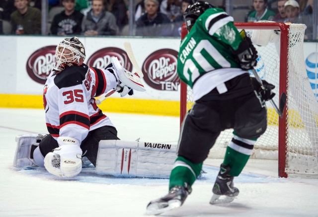 Cory Schneider of the New Jersey Devils and Cody Eakin of the Dallas Stars