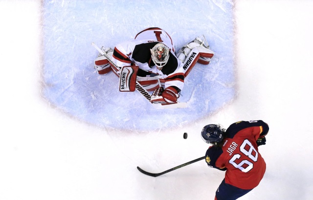 Keith Kindaid of the New Jersey Devils and Jaromir Jagr of the Florida Panthers