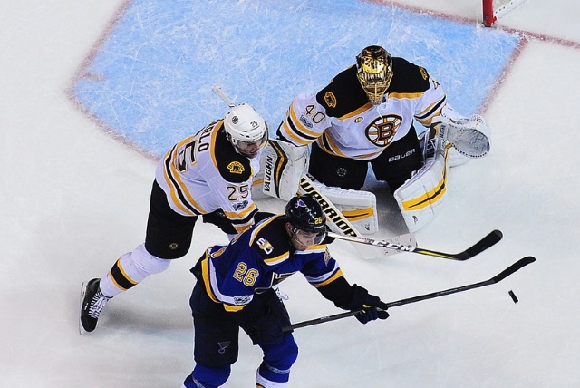 Paul Stastny of the St. Louis Blues and Brandon Carlo of the Boston Bruins