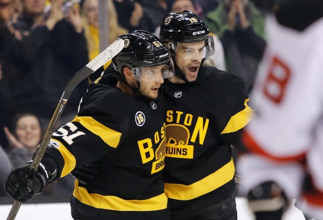 Ryan Spooner and Drew Stafford of the Boston Bruins