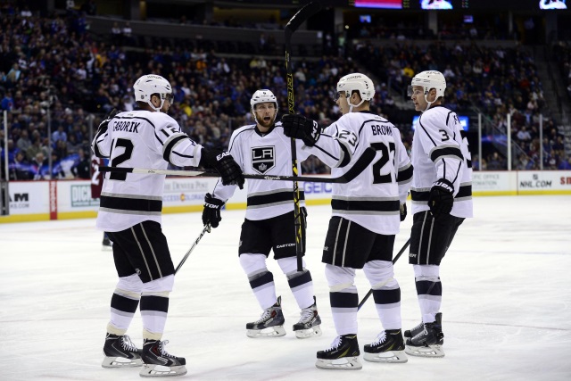 Dustin Brown, Marian Gaborik and Jake Muzzin of the Los Angeles Kings