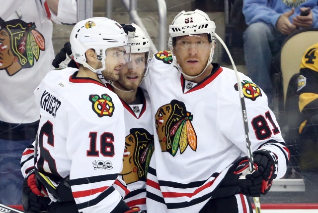 Chicago Blackhawks forwards Marcus Kruger, Ryan Hartman and Marian Hossa