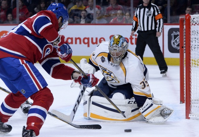 Alex Galchenyuk of the Montreal Canadiens and Pekka Rinne of the Nashville Predators