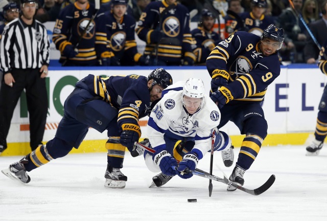 Evander Kane of the Buffalo Sabres and Ondrej Palat of the Tampa Bay Lightning