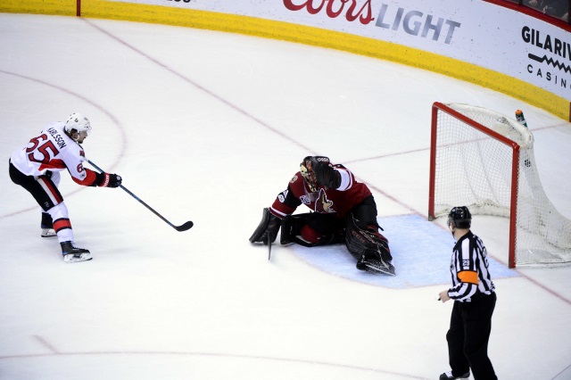 Erik Karlsson of the Ottawa Senators and Mike Smith of the Arizona Coyotes