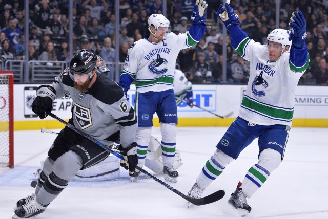 Vancouver Canucks forwards Bo Horvat and Henrik Sedin