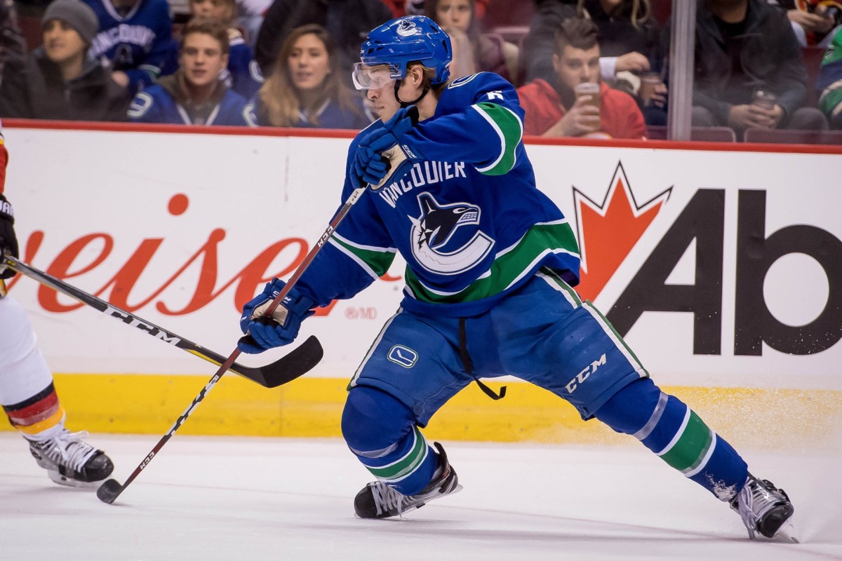 Vancouver Canucks Brock Boeser leaves after blocking a shot