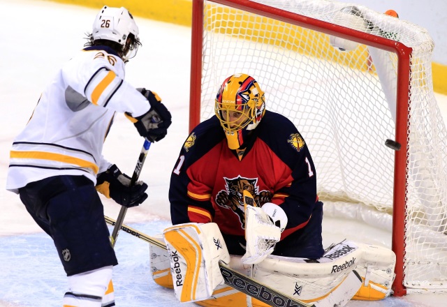 Roberto Luongo and Matt Moulson