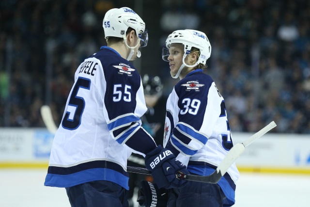 Mark Scheifele and Toby Enstrom