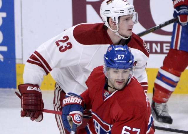 Oliver Ekman-Larsson and Max Pacioretty