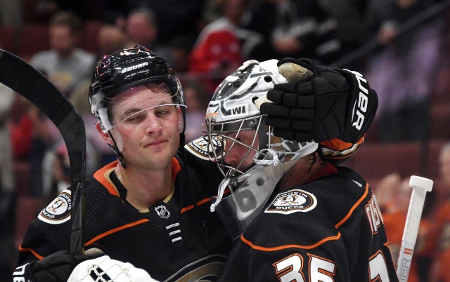 Cam Fowler and John Gibson