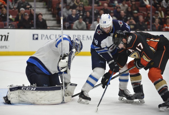 Ryan Kesler and Connor Hellebuyck