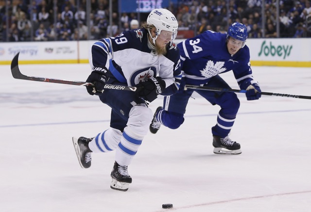 Auston Matthews of the Toronto Maple Leafs and Patrik Laine of the Winnipeg Jets