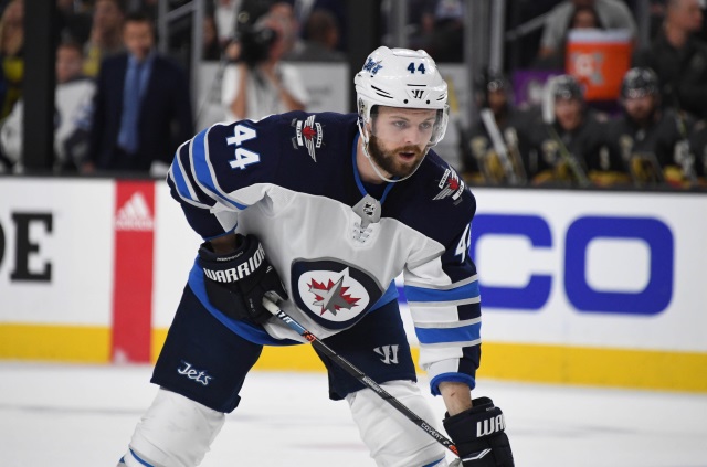 The Winnipeg Jets sign restricted free agent defenseman Josh Morrissey to a bridge deal