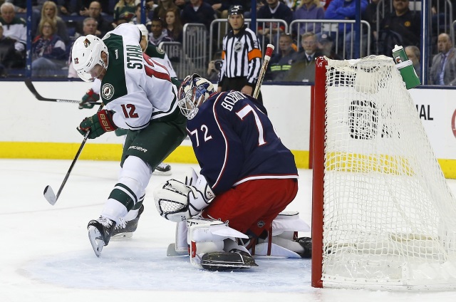 Columbus Blue Jackets goaltender Sergei Bobrovsky and Minnesota Wild forward Eric Staal