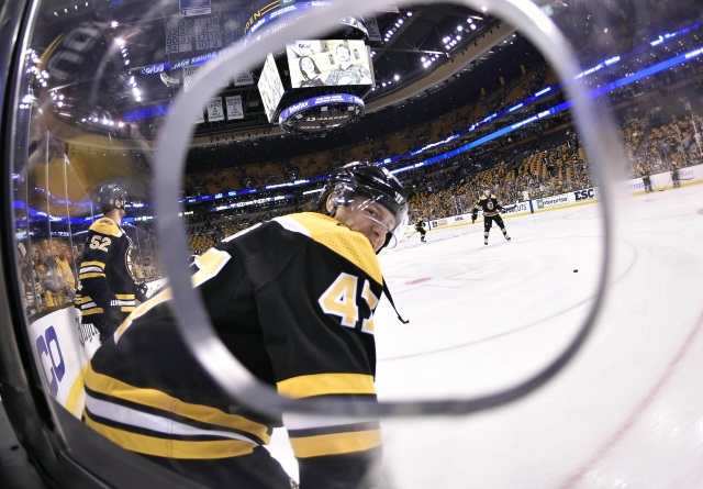 Torey Krug practices with teammates yesterday.