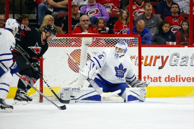 The Carolina Hurricanes claim Curtis McElhinney off waivers.