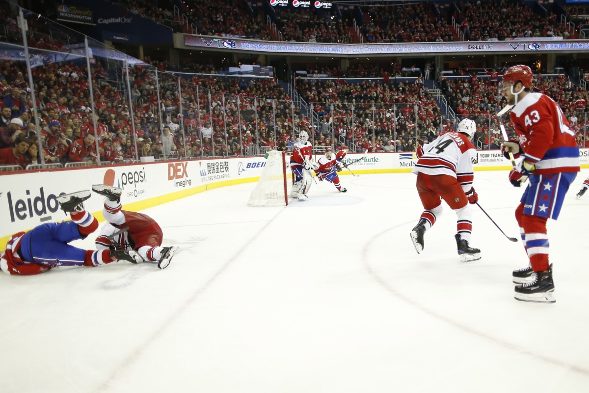 Matt Niskanen crashes hard headfirst into the boards.