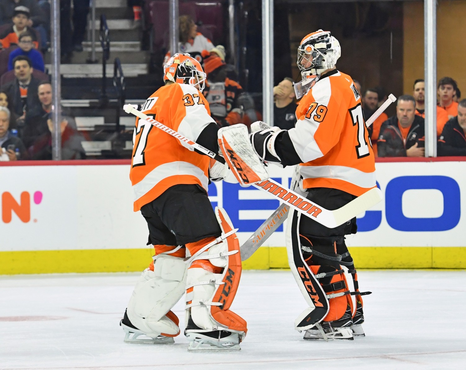 Philadelphia Flyers goaltenders Carter Hart and Brian Elliott