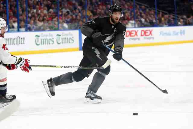 Victor Hedman leaves early after taking a helmet to the chin.