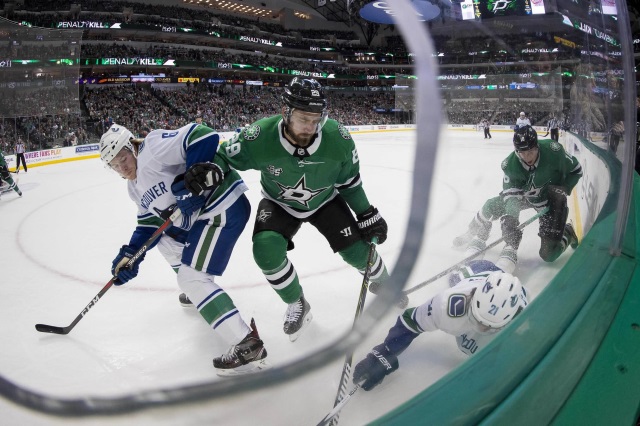 Vancouver Canucks coach Travis Green disappointed in Loui Eriksson's comments., not worried that Brock Boeser not signed yet.