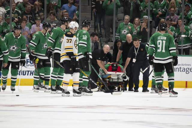 Roman Polak taken off on a stretcher.