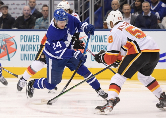 Toronto Maple Leafs Kasperi Kapanen and Calgary Flames Oliver Kylington