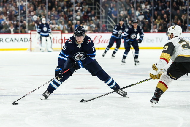 Latest on Winnipeg Jets speculation involving Laine, Roslovic and Lewis. The pros and cons of the Los Angeles Kings trading for Dubois.