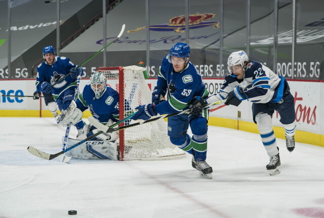 More Vancouver Canucks added to COVID protocol list. Dallas Stars thinking false positive for coach Rick Bowness. Two players put on waivers.