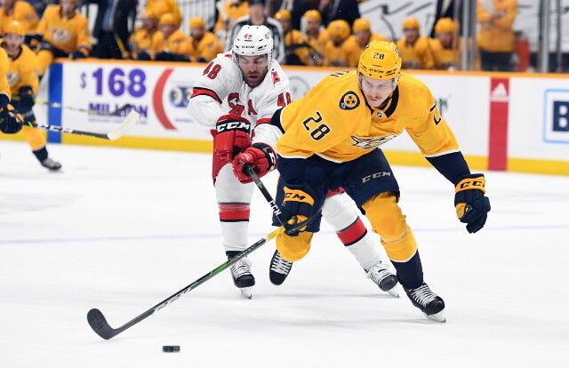 Coyotes sign 2021 first-round pick Dylan Guenther. Blackhawks file MacKenzie Entwistle contract. Predators sign Eeli Tolvanen for three years