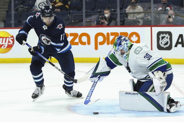 Three first-round picks leaning towards signing and one to return to school. Vancouver Canucks Spencer Martin and Bruce Boudreau.