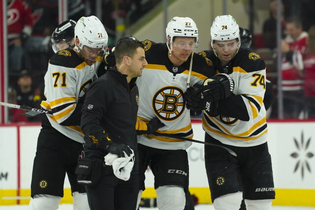 Hampus Lindholm helped off after a big hit from Svechnikov. Annti Raanta leaves after a collision with David Pastrnak Michael Bunting returns.