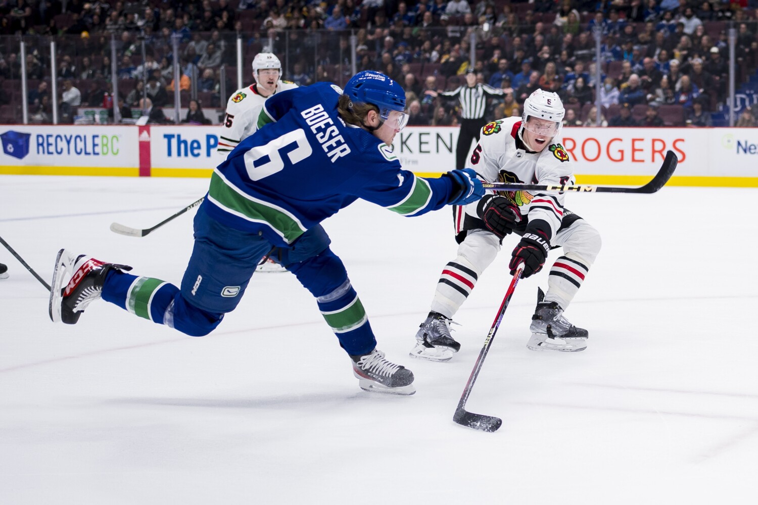 Will the Vancouver Canucks qualify restricted free agent Ethan Bear? Idea of moving up in the draft, and Brock Boeser staying put.