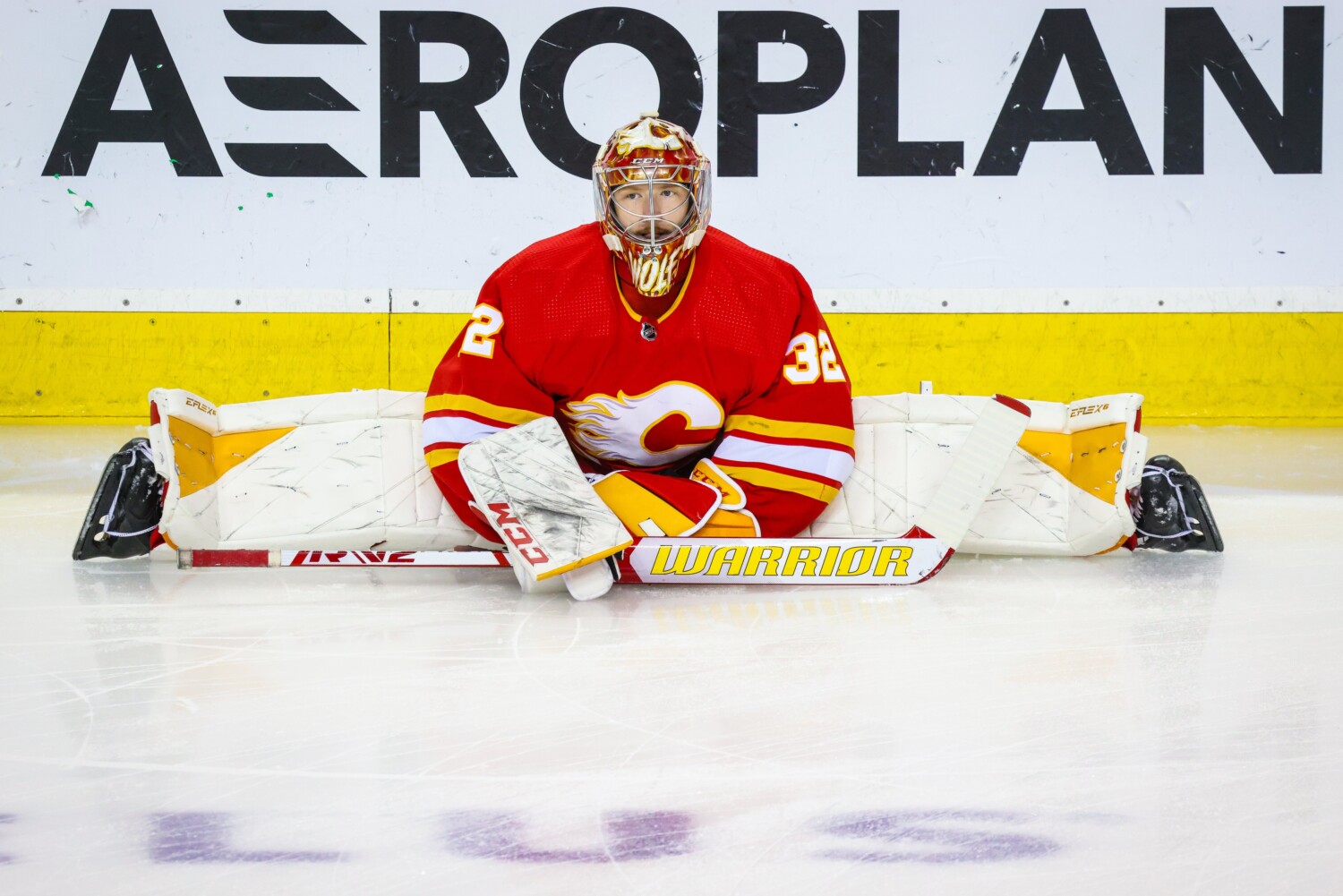 Dustin Wolf being sent to the AHL by the Calgary Flames, and two Philadelphia Flyers prospects trying to earn a roster spot.