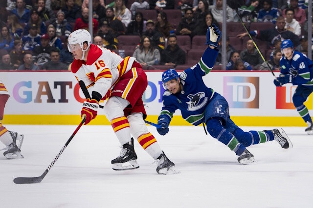 Sources are saying the Vancouver Canucks are looking to make some moves and could be eyeing two Calgary Flames defensemen.