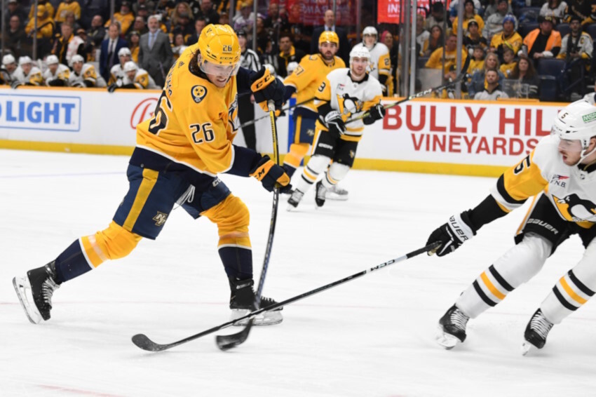 The Nashville Predators traded forward Philip Tomasino to the Pittsburgh Penguins for a 2027 fourth-round pick